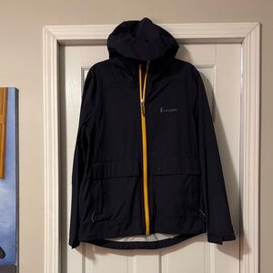 Cotopaxi Men's Dark Blue Raincoat with Yellow Zipper